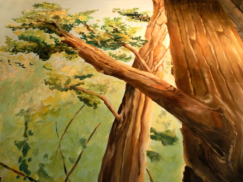 détail d'une fresque murale avec des arbres dans la forêt dans les tons vert/marron